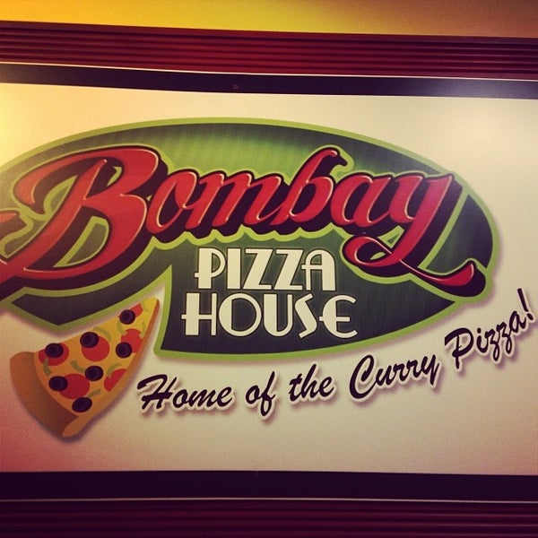 Photo taken at Bombay Pizza House by Dee on 12/23/2013