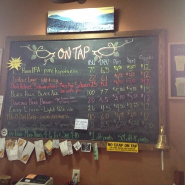 Photo taken at Crow Peak Brewing Company by Christy H. on 5/18/2013