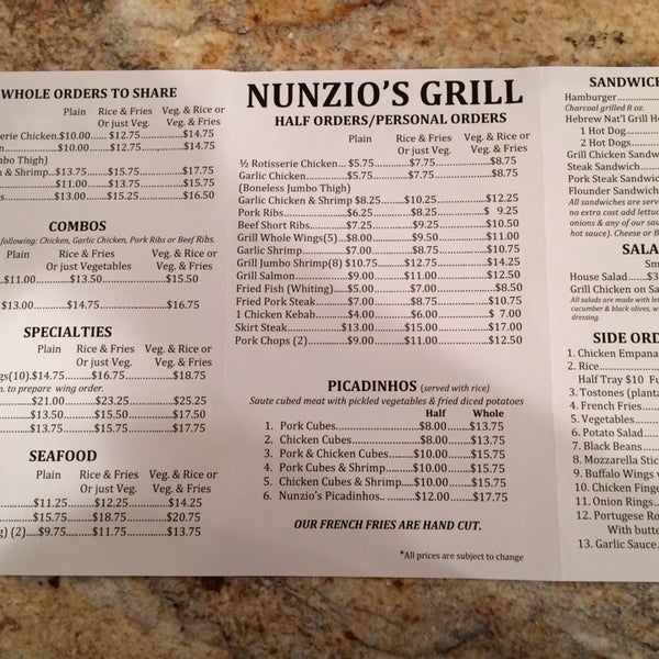 Photo taken at Nunzio&#39;s Charcoal Grill by Emil H. on 12/29/2013