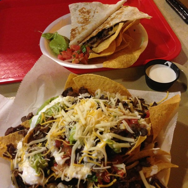Photo taken at Taco Shop Mexican Grill by Angela D. on 3/6/2013