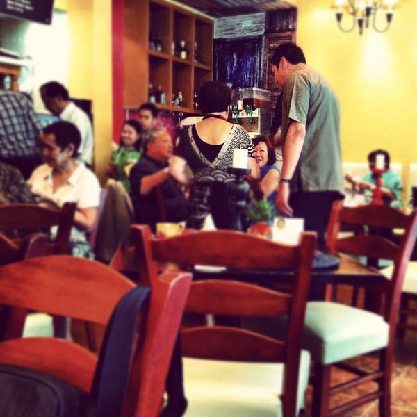 Photo taken at Achiote Taqueria by Tim Q. on 9/26/2012