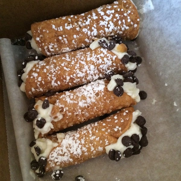 A great little Italian deli/grocer. They actually fill the cannoli while you wait so they don't become too soggy by sitting around. The smaller ones are perfect for tea or a small dessert. Try them!