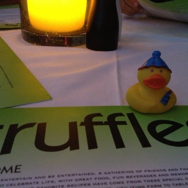 Photo taken at Truffles Cafe by Patty C. on 8/2/2013