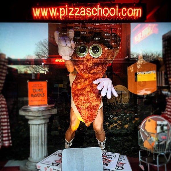 Photo taken at Pizza School NYC by Eric I. on 3/23/2015