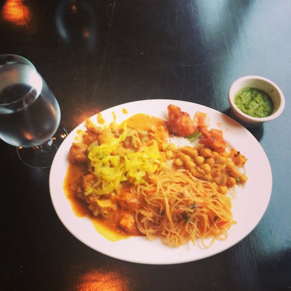 Photo taken at Mantra Indian Cuisine &amp; Bar by Sora C. on 8/9/2014