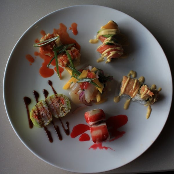 Снимок сделан в Fusion Fire Asian Fondue &amp; Sushi Bar пользователем Fusion F. 4/13/2013