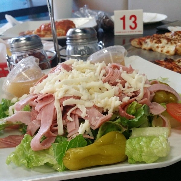 Photo taken at Deli News Pizza by Cole E. on 5/23/2014