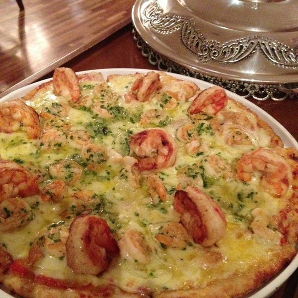 12/28/2012 tarihinde Marcio M.ziyaretçi tarafından Pezzi Pizzeria Gourmet'de çekilen fotoğraf