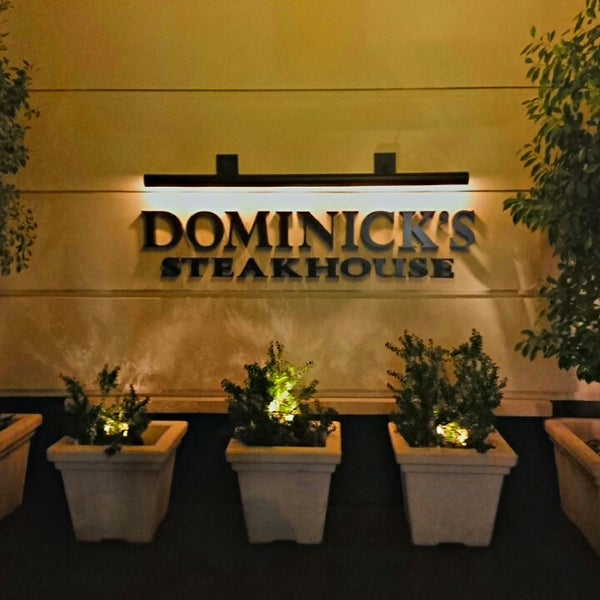 Photo taken at Dominick&#39;s Steakhouse by Christian D. on 7/24/2013