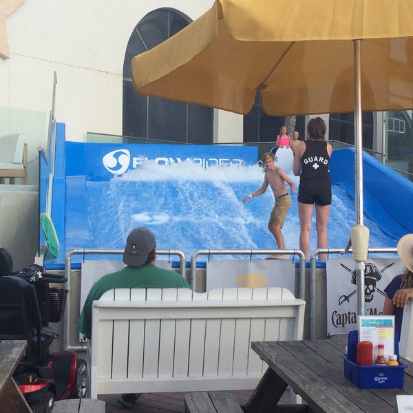 Photo taken at WaveHouse Beach Club by Mike V. on 7/10/2015