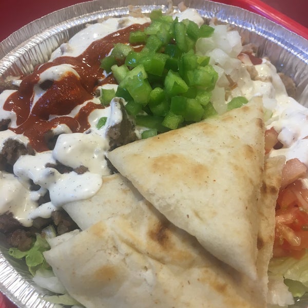 Photo taken at The Halal Guys by Terrence H. on 4/15/2016