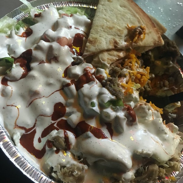 Photo taken at The Halal Guys by Terrence H. on 5/7/2016