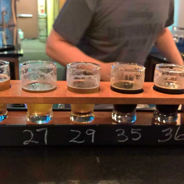 Photo taken at Westside Taphouse &amp; Growler Fill by Jeffrey C. on 5/5/2018