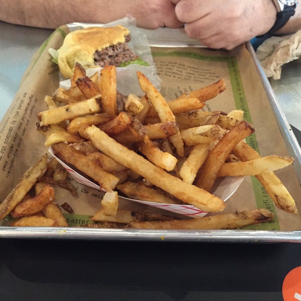 Photo taken at BurgerFi by Lizz H. on 7/1/2015