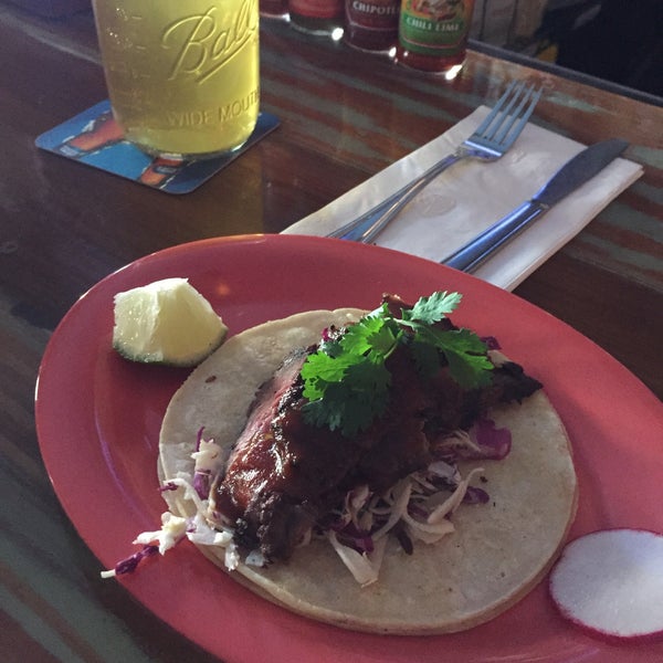 Photo taken at Ho&#39; Brah Taco Joint by Irvin I. on 3/24/2015