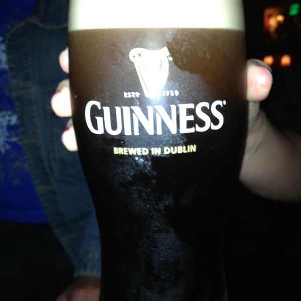 Photo taken at The Field Irish Pub &amp; Eatery by Ivan B. on 12/28/2012