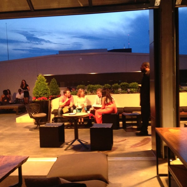 Photo taken at Stratus Rooftop Lounge by UrbanFoodMaven on 5/11/2013