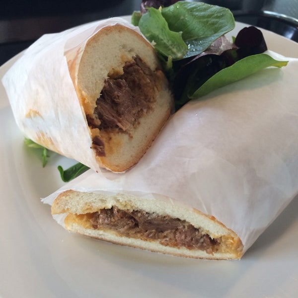 Try the braised brisket sandwich. Braised beef brisket, red pepper & horseradish aioli, fried shallots, and frisee on a baguette$9.25