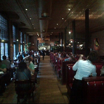 Photo taken at Bâton Rouge Steakhouse &amp; Bar by C. B. on 5/2/2012