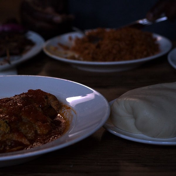Foto diambil di Buka Nigerian Restaurant oleh Justin F. pada 9/18/2014