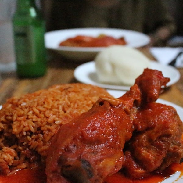 Photo taken at Buka Nigerian Restaurant by Justin F. on 6/8/2014