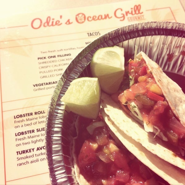 Photo taken at Odie&#39;s Ocean Grill by Emily M. on 5/25/2014