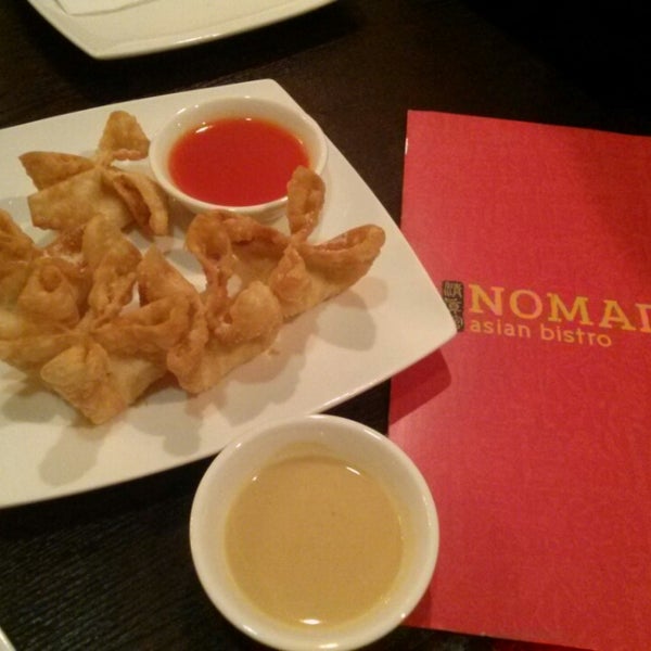 Photo taken at Nomad Asian Bistro by Just T. on 11/29/2013