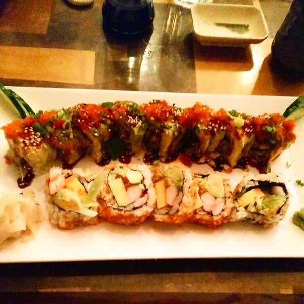 Photo taken at Planet Sushi by Mario S. on 1/3/2015