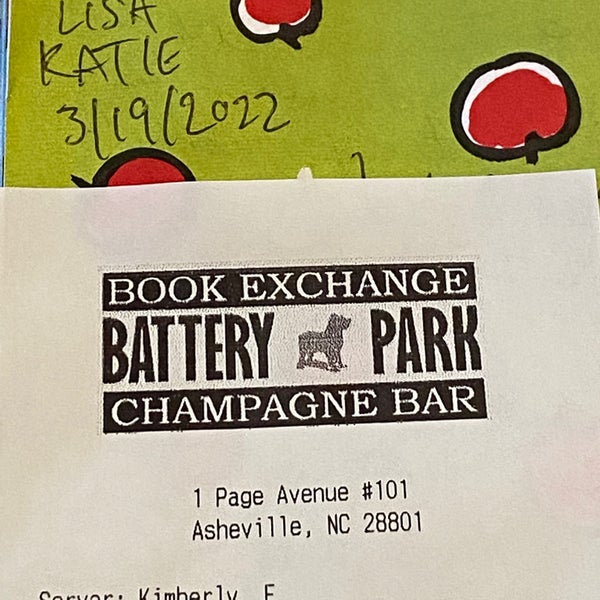 Photo taken at Battery Park Book Exchange And Champagne Bar by Jason on 3/19/2022