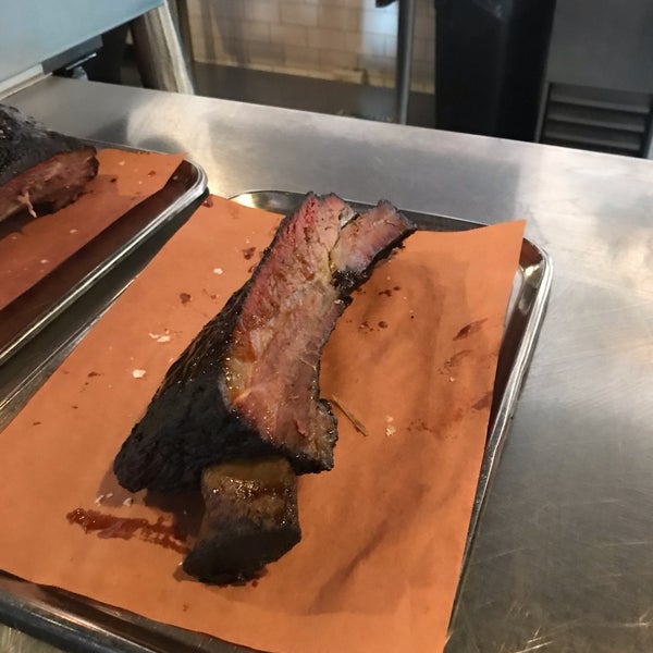 Photo taken at Mighty Quinn&#39;s BBQ by Billy S. on 1/25/2019