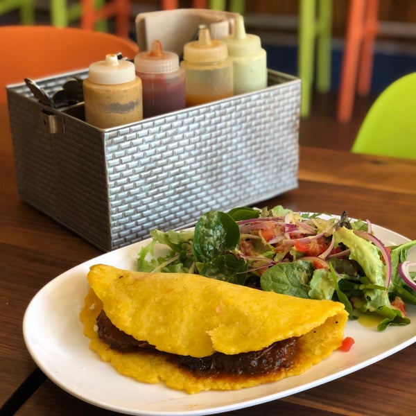 Photo taken at Pica Pica Arepa Kitchen by Adam S. on 3/14/2019