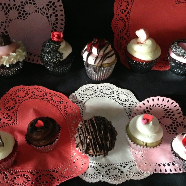 Photo taken at Firefly Cupcakes by wendy e. on 2/14/2013