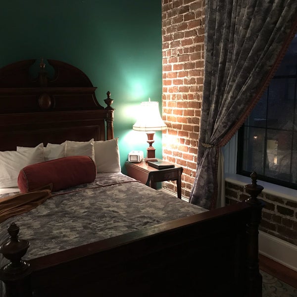 Cozy rooms with exposed brick walls. Also, this is a haunted inn!