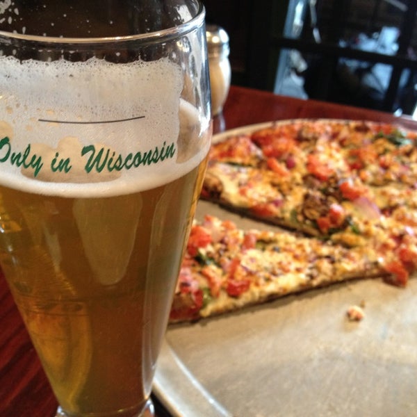 Photo taken at Glass Nickel Pizza Co. - Madison East by Angela W. on 6/4/2013