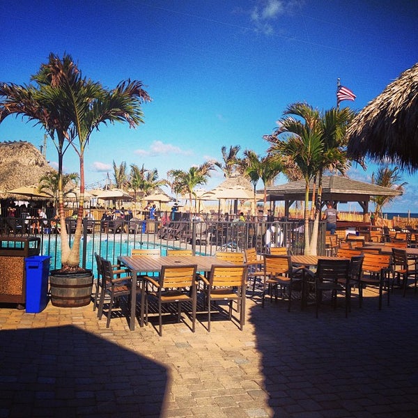 Photo taken at Sea Shell Resort and Beach Club by Frankie G. on 9/28/2013