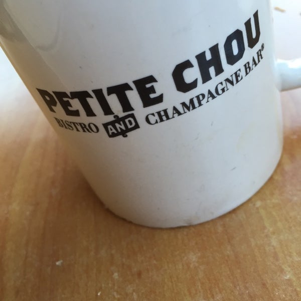 Photo taken at Petite Chou Bistro and Champagne Bar by Matt H. on 10/25/2014