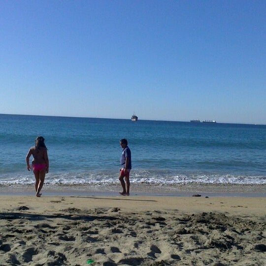 Photo taken at Playa Caleta Portales by ~Grisel~ on 3/9/2013