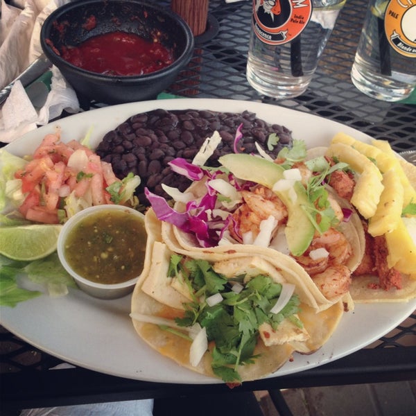 Photo taken at Taqueria Tavern by Caitlin C. on 6/6/2013