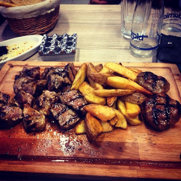 Photo taken at NİŞET KASAP Steakhouse by İlhan K. on 9/1/2014