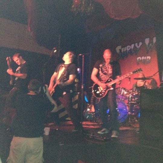 Photo taken at Surly Wench Pub by Elizabeth W. on 9/29/2012