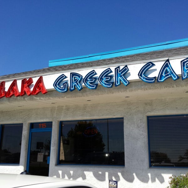 Photo taken at Plaka Greek Cafe by Chris on 9/23/2013