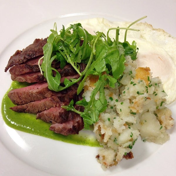 Flank steak served with over easy eggs, hashed potatoes, tomatillo salsa and arugula. Join us for brunch from 10:00 to 2:00 today.