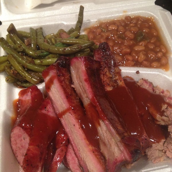 Awesome BBQ & prices! The sausage is good, ribs fall off the bone & brisket is super tender! And they take green beans to a new level! Yum!