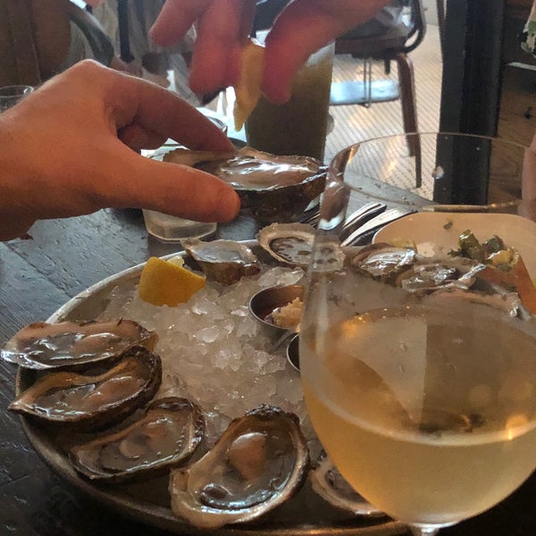 Photo taken at Dylan&#39;s Oyster Cellar by Sam M. on 7/10/2021