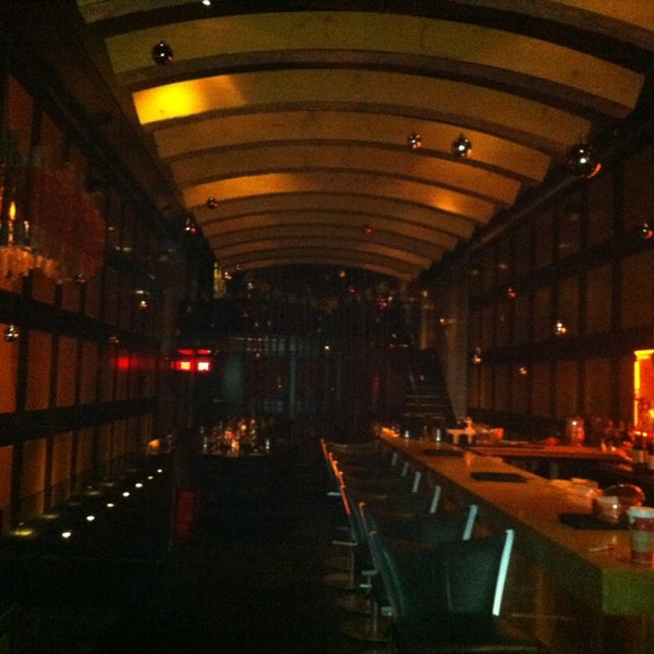 Photo taken at Carnevor Steakhouse Moderne by Andrea B. on 12/31/2012