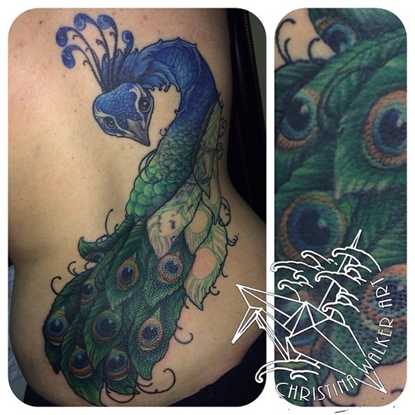 Photo taken at Lucky Bamboo Tattoo by Christina W. on 2/2/2014
