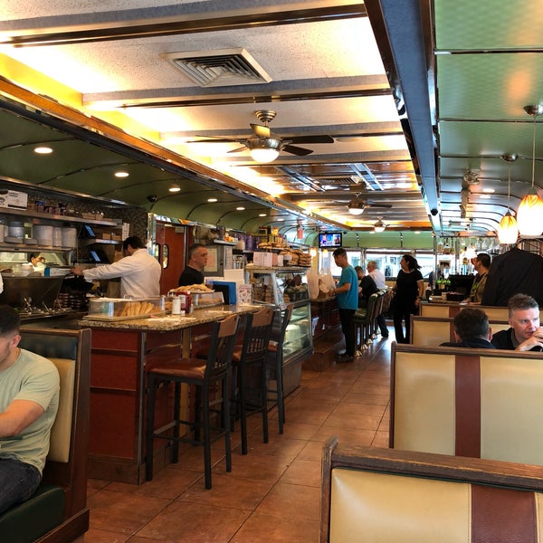 Photo taken at Court Square Diner by Ivan B. on 9/21/2018