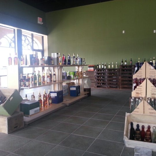 Photo taken at Tusk &amp; Barrel Whole Sale Liquor Store by Ralph R. on 10/17/2012