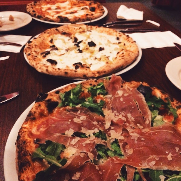 Neapolitan is the only pizza that's acceptable (and expected) to be eaten with a fork and knife. Cut into a Margherita, Carciofo, or an A Mano -- you can't go wrong with any of them. Because, pizza!
