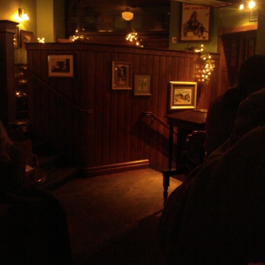 Photo taken at The Irish Embassy Pub by Katya K. on 12/27/2012